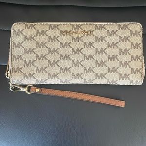 MK monogram wallet/clutch